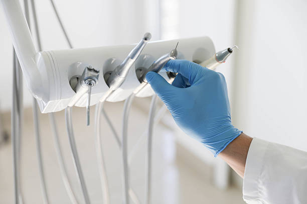Professional Root Canal Treatment technician working in Lehigh Acres, FL